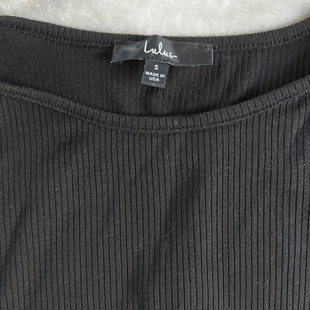 Black open back bodysuit, long sleeved with tie back
